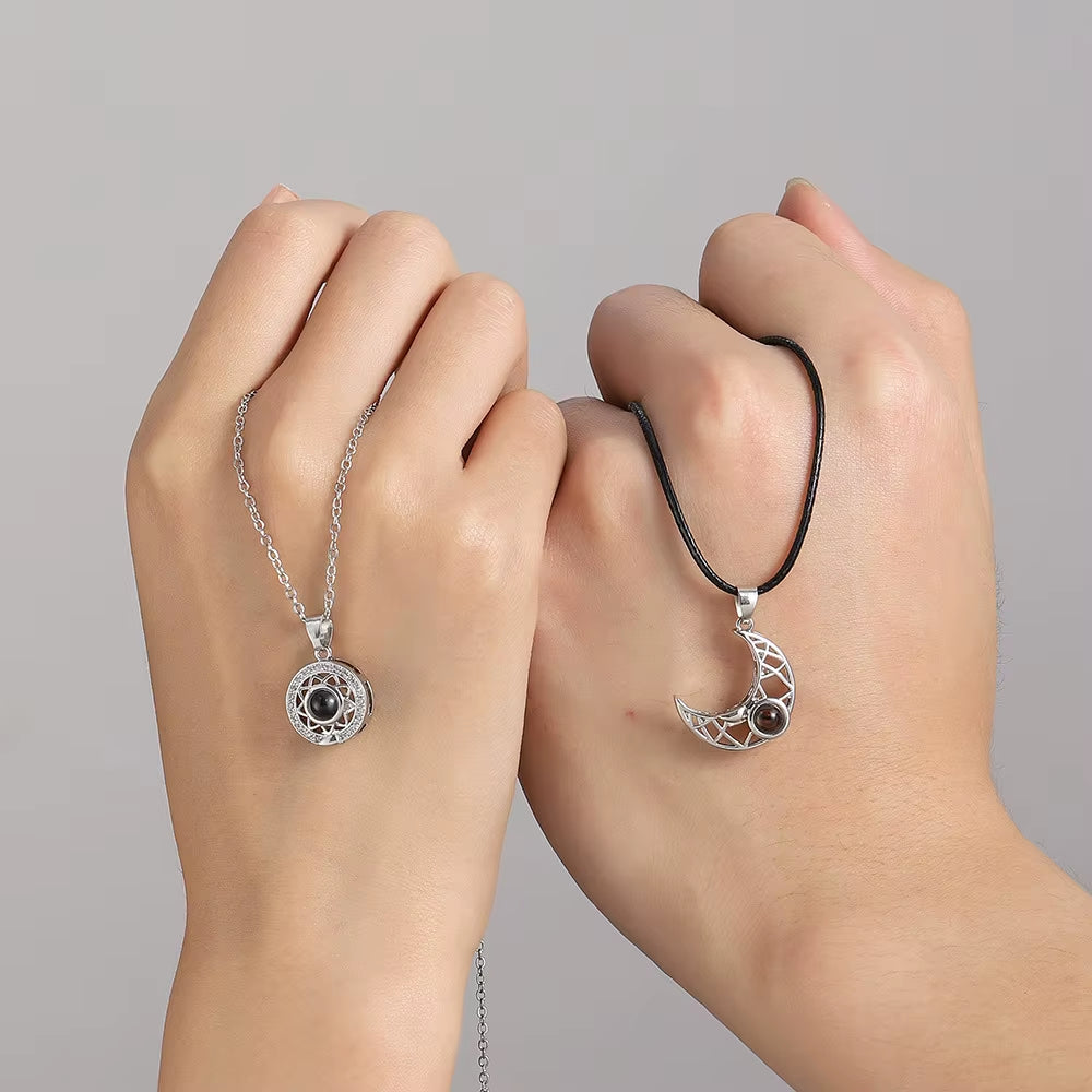 Magnetic couple necklace set featuring matching sun and moon pendants designed to connect through a secure magnetic link