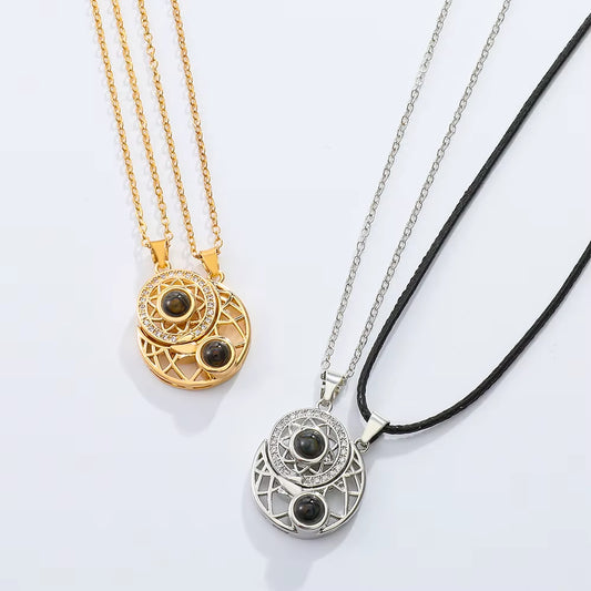 Magnetic couple necklace set featuring matching sun and moon pendants designed to connect through a secure magnetic link