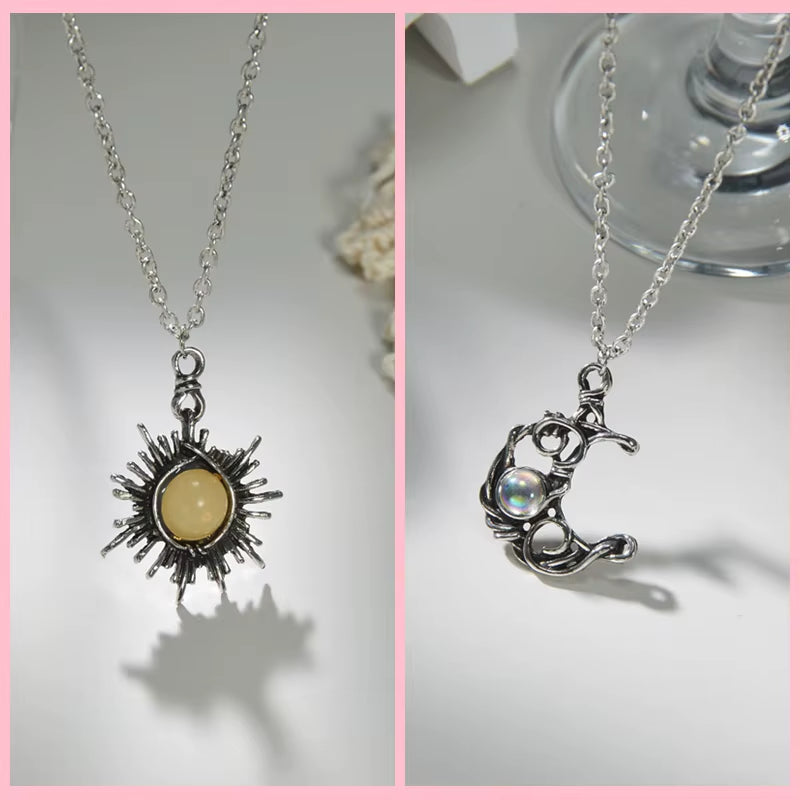 Magnetic couple necklace set featuring matching sun and moon pendants designed to connect through a secure magnetic link