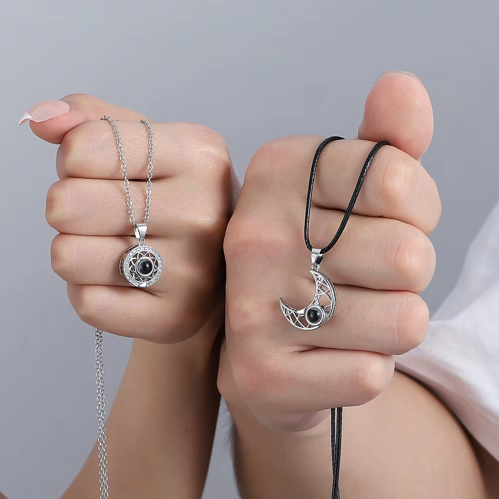 Magnetic couple necklace set featuring matching sun and moon pendants designed to connect through a secure magnetic link